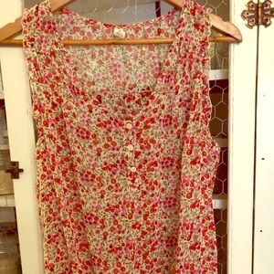 Flowered red sleeveless blouse